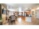 Open-concept kitchen with stainless steel appliances and a dining area at 7274 W State Ave, Glendale, AZ 85303