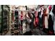 Well-organized walk-in closet with shelves and racks for ample storage at 7274 W State Ave, Glendale, AZ 85303