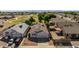 Aerial view of a single-Gathering home featuring solar panels, desert landscaping, and two-car garage at 8668 N 107Th Dr, Peoria, AZ 85345