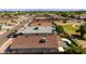 Aerial view showcases the home's proximity to a pool and its well-maintained surroundings at 8668 N 107Th Dr, Peoria, AZ 85345
