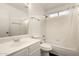 Bright bathroom featuring a white vanity, and a shower-over-tub combination at 8668 N 107Th Dr, Peoria, AZ 85345