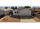 Inviting single Gathering home with low maintenance desert landscaping and two car garage at 8668 N 107Th Dr, Peoria, AZ 85345