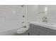 Clean bathroom features a shower-tub combo and modern vanity at 934 E Wahalla Ln, Phoenix, AZ 85024