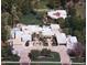 Expansive estate showcasing lush landscaping, a sparkling pool, and a circular driveway. Guest house included at 94 Biltmore Estates Dr, Phoenix, AZ 85016