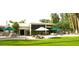 Lovely backyard patio with outdoor seating and lush landscaping, perfect for entertaining at 94 Biltmore Estates Dr, Phoenix, AZ 85016