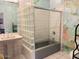 Bathroom showcasing a glass block shower enclosure and a stylish pedestal sink at 94 Biltmore Estates Dr, Phoenix, AZ 85016