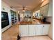 Spacious kitchen featuring custom cabinetry, stone countertops, and stainless-steel appliances at 94 Biltmore Estates Dr, Phoenix, AZ 85016