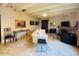 Cozy living room with ample seating, fireplace, and neutral decor, creating an inviting atmosphere at 94 Biltmore Estates Dr, Phoenix, AZ 85016