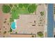 Overhead view of a house showing the roofline, sparkling pool and desert landscaping at 23090 S 201St St, Queen Creek, AZ 85142