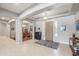 Welcoming foyer with neutral colors, arched doorways, and a view into the dining room at 23090 S 201St St, Queen Creek, AZ 85142