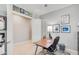 Home office with neutral walls, tile flooring, overhead lighting, and a modern desk at 23090 S 201St St, Queen Creek, AZ 85142