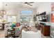 Welcoming living area with cozy seating, large windows for natural light, and modern finishes at 10342 E Obispo Ave, Mesa, AZ 85212