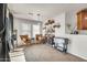 Entertaining space with built-in bar shelving, leather chairs and a portable cooler at 1147 E Harvest Rd, San Tan Valley, AZ 85140