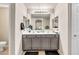 Bathroom featuring a double sink gray vanity, creating a functional space for daily routines at 1147 E Harvest Rd, San Tan Valley, AZ 85140