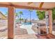 Entertainers backyard featuring a pool, desert landscaping and covered patio at 14039 S 33Rd Way, Phoenix, AZ 85044