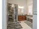 Beautiful primary bathroom featuring tiled walk-in shower, soaking tub and vanity at 14039 S 33Rd Way, Phoenix, AZ 85044