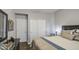 Bedroom features a dresser, closet, and lots of natural light at 14039 S 33Rd Way, Phoenix, AZ 85044