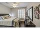 Bedroom featuring a ceiling fan, and dresser at 14039 S 33Rd Way, Phoenix, AZ 85044