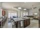 Open concept featuring a kitchen island with barstool seating and dining, connected to living area at 14039 S 33Rd Way, Phoenix, AZ 85044