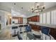 Kitchen features oversized island, stainless steel appliances and updated cabinetry at 14039 S 33Rd Way, Phoenix, AZ 85044