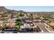Expansive aerial view showcases the home's location within a peaceful suburban community at 15630 N 20Th St, Phoenix, AZ 85022