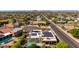 Overhead captures a yard pool, solar panels, and community nestled in the neighborhood at 15630 N 20Th St, Phoenix, AZ 85022