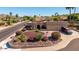 Aerial view of a well-kept single-Gathering house with lush landscaping and a two-car garage at 15630 N 20Th St, Phoenix, AZ 85022