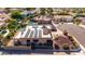 Aerial shot of home featuring solar panels, desert landscaping, and mature trees at 15630 N 20Th St, Phoenix, AZ 85022
