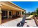 Enjoy this backyard with lounge seating, workout equipment, and beautiful landscaping for a private oasis at 15630 N 20Th St, Phoenix, AZ 85022