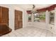 Bright breakfast nook features tiled floor, ceiling fan and direct backyard views at 15630 N 20Th St, Phoenix, AZ 85022