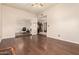 Spacious dining room with hardwood floors leading to a glass table at 15630 N 20Th St, Phoenix, AZ 85022