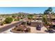 A home with attractive landscaping, a two-car garage, a red tile roof and views of the surrounding mountains at 15630 N 20Th St, Phoenix, AZ 85022