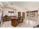 Open-concept kitchen includes an island, breakfast nook, and plenty of counter space at 15630 N 20Th St, Phoenix, AZ 85022