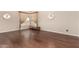 Stylish living room featuring hardwood floors, soft lighting, and decorative window features at 15630 N 20Th St, Phoenix, AZ 85022