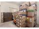 Room filled with moving boxes and some furniture, ready for packing or unpacking at 15630 N 20Th St, Phoenix, AZ 85022