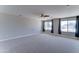 Bright bedroom with neutral walls, carpet flooring, and dual windows offering natural light at 1716 W Villa Theresa Dr, Phoenix, AZ 85023