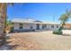 Charming single-story home featuring a well-maintained front yard with desert landscaping at 1716 W Villa Theresa Dr, Phoenix, AZ 85023