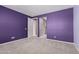 Bright bedroom with plush carpet, fresh neutral paint, and offers ample closet space at 17352 W Red Fox Rd, Surprise, AZ 85387