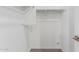 Walk-in closet with bright white walls and trim and neutral carpet at 17352 W Red Fox Rd, Surprise, AZ 85387