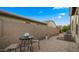 Private backyard featuring a cozy seating area, perfect for outdoor relaxation and enjoying serene moments at 17850 E Bronco Ct, Queen Creek, AZ 85142
