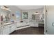 Bright bathroom with a soaking tub, double vanities, and a separate shower for ultimate relaxation at 17850 E Bronco Ct, Queen Creek, AZ 85142