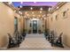 Cozy outdoor patio with seating area and decorative string lights overhead at 17850 E Bronco Ct, Queen Creek, AZ 85142
