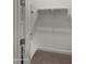 Empty walk-in closet with basic shelving providing optimal storage solutions at 17850 E Bronco Ct, Queen Creek, AZ 85142
