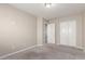 Neutral bedroom with plush carpet, closet, and paneled door to hall at 2000 N 36Th St # 19, Phoenix, AZ 85008