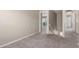 Upstairs hallway with plush carpet leads to multiple rooms in the house at 2000 N 36Th St # 19, Phoenix, AZ 85008