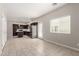 Open concept view of kitchen with stainless appliances, dark cabinetry, and eat in kitchen at 2000 N 36Th St # 19, Phoenix, AZ 85008
