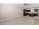 Kitchen with stainless steel appliances, center island, and dark wood cabinets at 2000 N 36Th St # 19, Phoenix, AZ 85008
