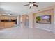 Spacious living room with tile flooring and an open layout, perfect for entertaining at 20277 N 68Th Dr, Glendale, AZ 85308