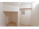 Walk-in closet featuring white walls, and tiled floors at 20277 N 68Th Dr, Glendale, AZ 85308