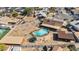 An aerial view of the backyard pool, trampoline and other outdoor features at 2319 N 71St Dr, Phoenix, AZ 85035